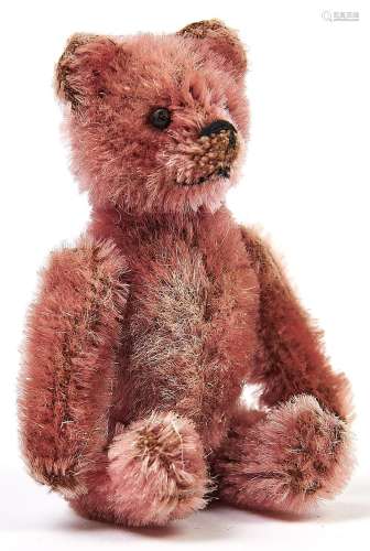 A Schuco miniature pink teddy bear novelty powder compact, w...