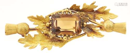 A gold bar brooch set with a citrine, marked 15ct, 4.9g