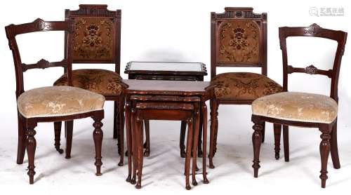 A pair of Victorian walnut framed dining chairs with concave...