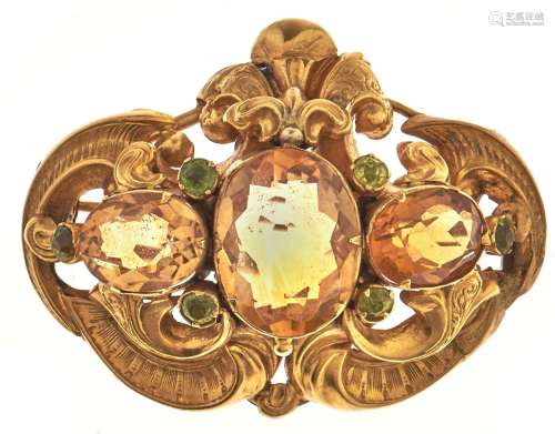 A Victorian citrine and peridot brooch, c1860, in gold, 41mm...