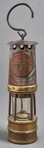 A Hailwood & Ackroyd Limited improved miner's safety lamp, t...
