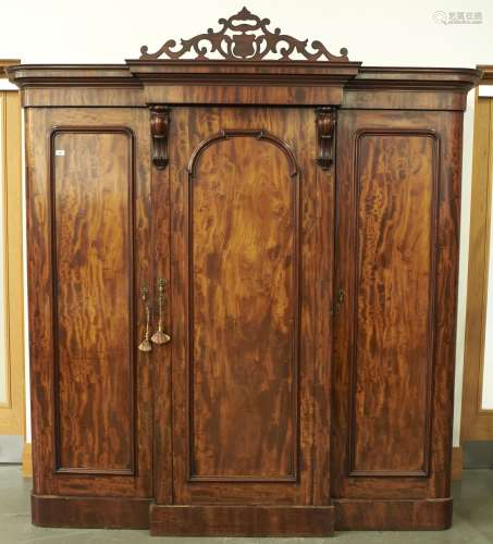 A Victorian figured mahogany breakfront wardrobe, c1870, the...