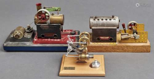 A Bohm Stirling model hot air engine, on varnished lightwood...