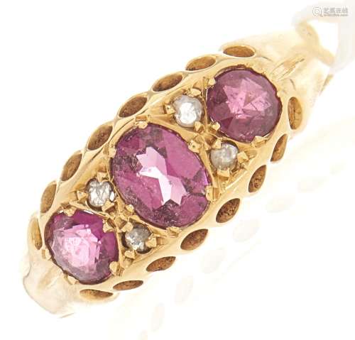 An amethyst and diamond ring, in gold marked 18ct, 2.9g, siz...