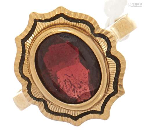 A garnet ring, in gold marked 750, 4.3g, size M