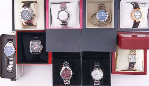 Nine various lady's and gentleman's fashion watches, boxed /...