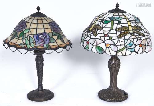 Two Tiffany style table lamps, the coloured glass shades dec...