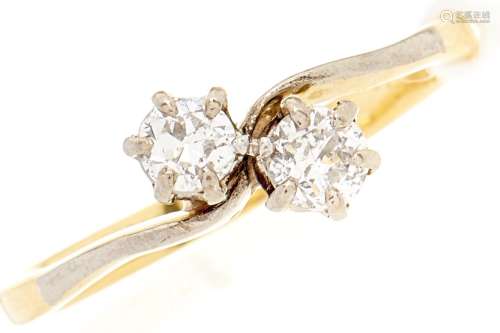 A diamond crossover ring, in gold marked 18ct, 2g, size K½