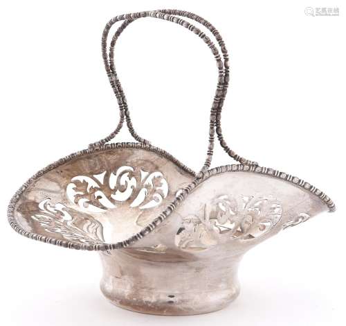 A George V pierced silver bonnet basket, with entwined handl...