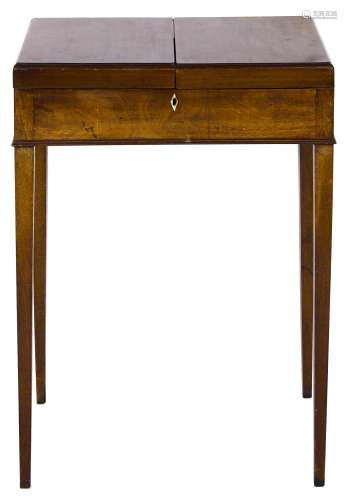 A George III mahogany dressing table, c1800, the top hinged ...