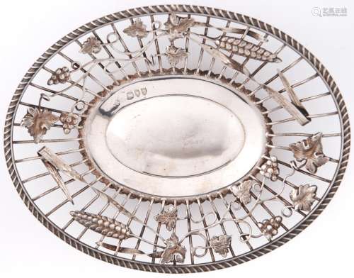 A Victorian oval silver wirework basket in George III style,...