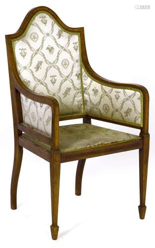A Victorian mahogany elbow chair, line inlaid with satinwood...