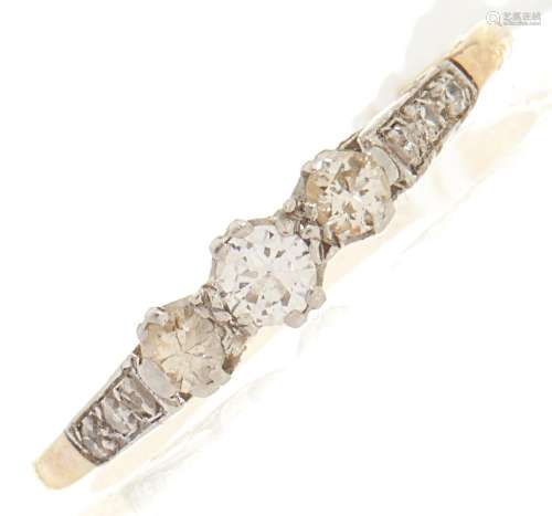 A three stone diamond ring, in gold marked 18, 1.8g, size O½
