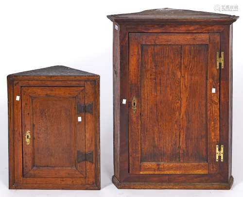 A Victorian oak corner cupboard with panelled door, 91cm h; ...