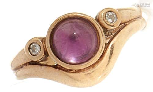 A diamond and amethyst cabochon ring, in gold marked 9ct, 2....