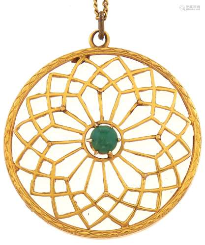 A 9ct gold openwork pendant set with central turquoise stone...