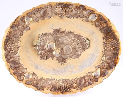 A George III oval silver dish, later chased and gilt as a si...