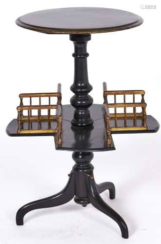 A Victorian ebonised revolving book table, c1870, with paint...