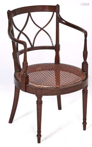 A mahogany and line inlaid elbow chair, early 20th c, in Reg...