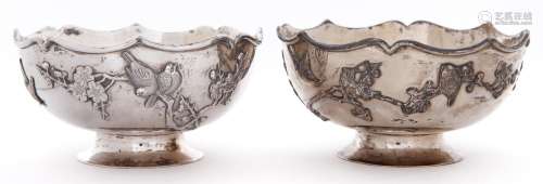 A pair of Chinese silver bowls, early 20th c, applied with r...