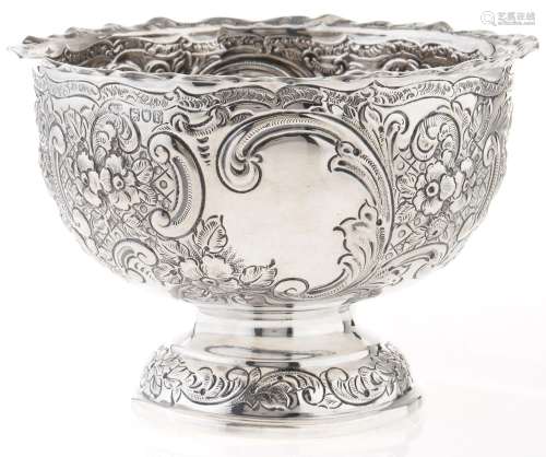 An Edwardian silver rose bowl, die stamped with flowers and ...