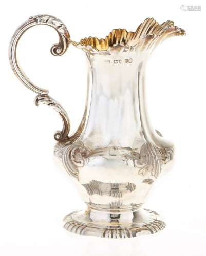 A Victorian silver cream jug, en suite with the following lo...