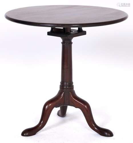 A George III mahogany tripod table, the tilt top with birdca...