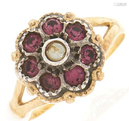 A paste cluster ring, in gold marked 750, 3.6g, size L