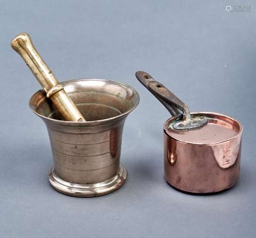 A Victorian copper saucepan and lid, a Victorian brass bottl...