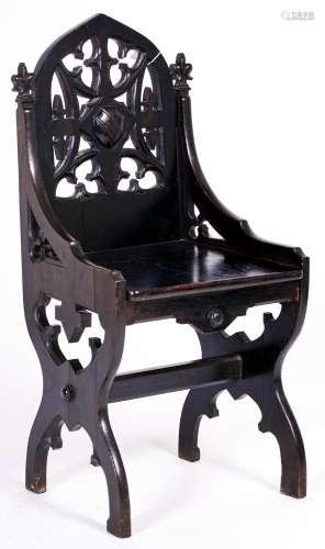 A Victorian ebonised mahogany hall chair with pierced splat,...