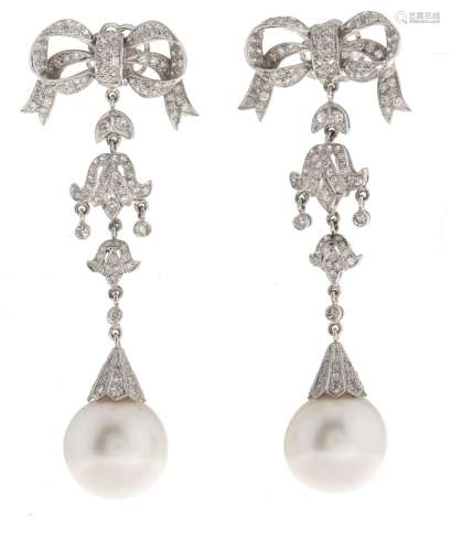 A pair of diamond and South Sea cultured pearl earrings, the...