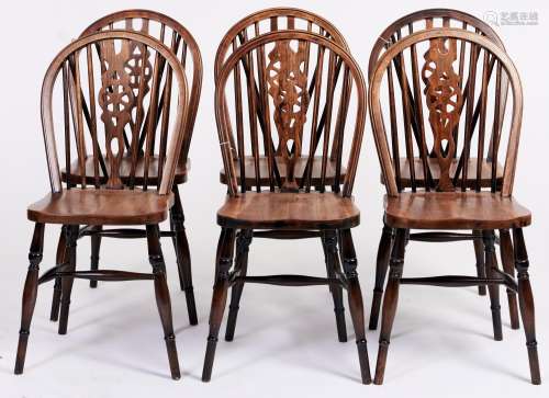 A set of six stained ash wheel back dining chairs, in Victor...