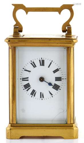A French brass carriage timepiece, with swing carrying handl...