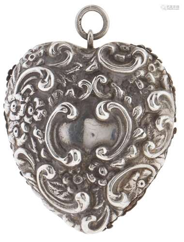 A Victorian heart shaped silver pin cushion, embossed scroll...