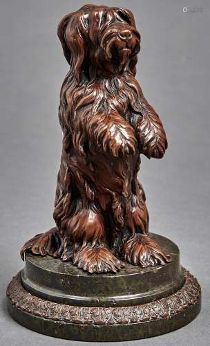 A bronzed metal sculpture of a begging dog, early 20th c, on...