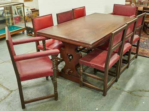 A set of eight oak dining chairs, covered with red nailed ba...