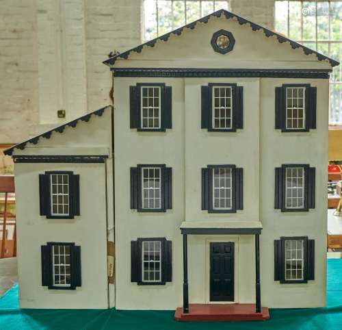 A painted wooden doll's house, mid 20th c, grey roof, white ...