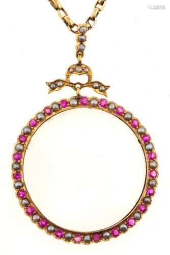 A ruby, split pearl and gold locket, marked 9ct and a gold n...