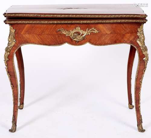 A French ormolu mounted kingwood card table, c1870, in Louis...