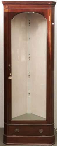 A reproduction mahogany standing corner cupboard, third quar...