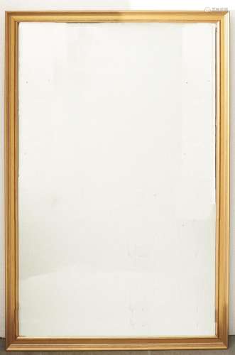 A reproduction gilt framed mirror with degraded period plate...