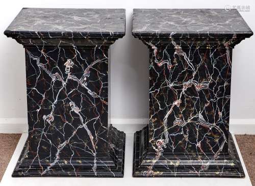 A pair of faux marble pedestals, 20th c, of painted wood, 73...