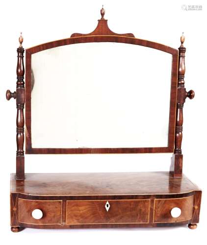 A George III line inlaid mahogany dressing mirror, with turn...