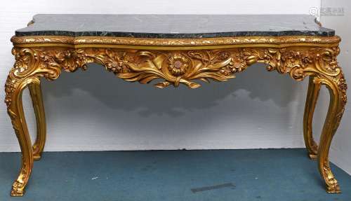 A giltwood side table, late 20th c, in mid 18th c Rococo sty...