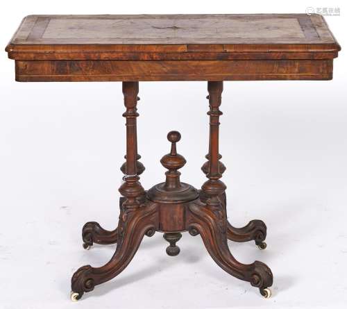 A Victorian inlaid walnut folding card table, with quarter v...