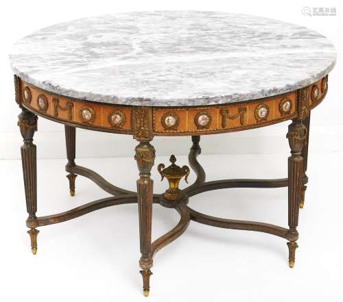 A giltmetal mounted mahogany-stained low round table, with m...