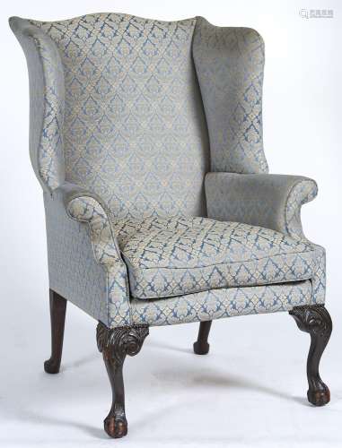 A George II mahogany framed wingback armchair, c1770, the se...