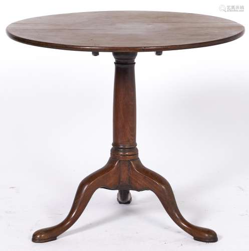 A George III mahogany tilt top tripod table, 84cm diam Top s...