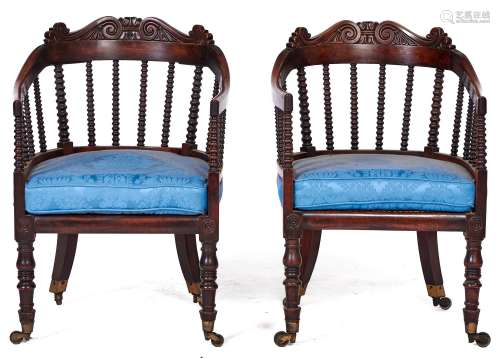 A pair of Victorian mahogany bergeres, c1850, the back hoop ...