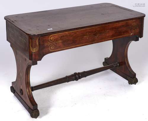 A Regency brass inlaid rosewood library table, c1820, the de...